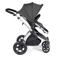 Ickle Bubba Stomp LUXE Travel System with Stratus Car Seat & ISOFIX Base (Silver/Charcoal/Black) - side view, showing the forward-facing pushchair