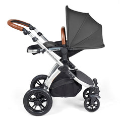 Ickle Bubba Stomp LUXE Travel System with Stratus Car Seat & ISOFIX Base (Silver/Charcoal/Tan) - showing the seat unit and chassis together as the pushchair in parent-facing mode with the seat reclined