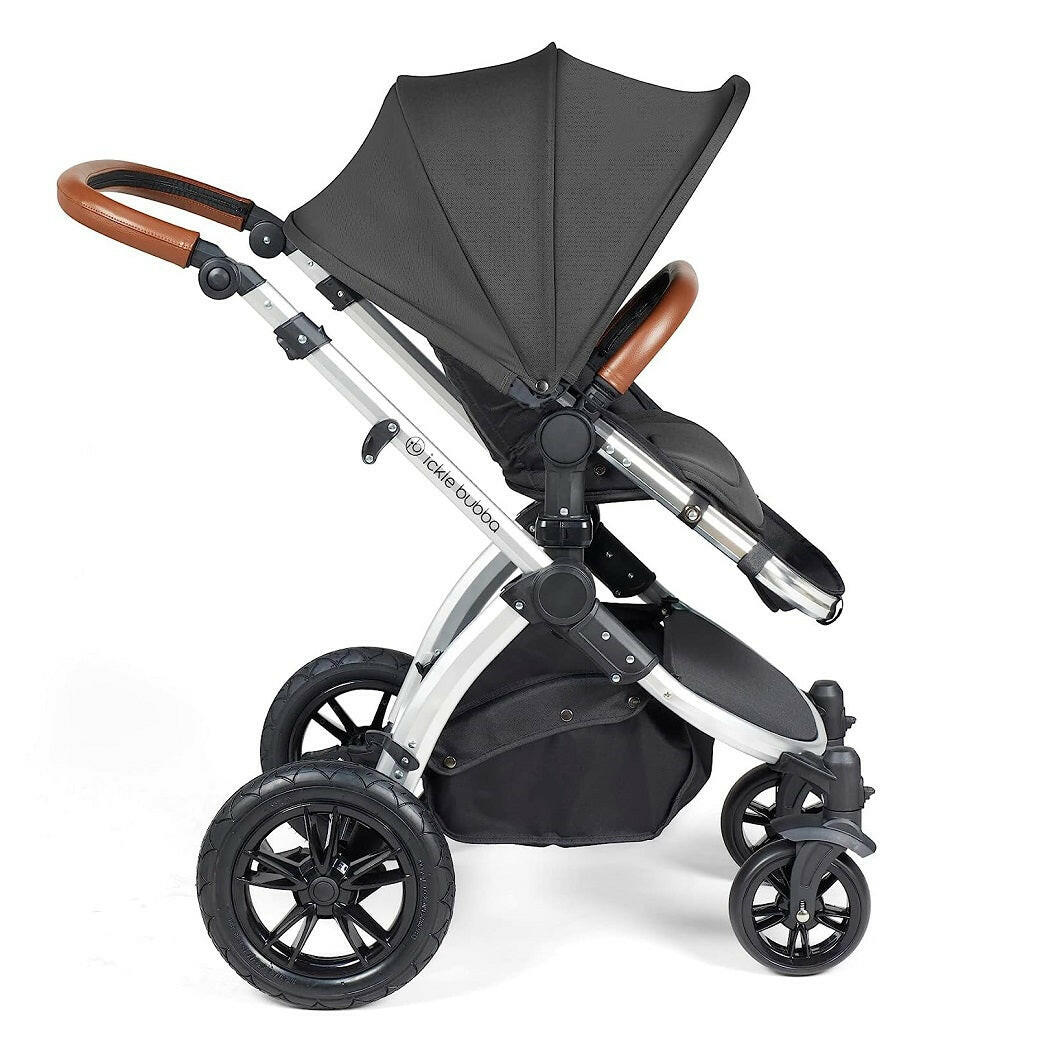 Ickle Bubba Stomp LUXE Travel System with Cirrus Car Seat & ISOFIX Base - Silver/Charcoal/Tan - side view, showing the forward-facing pushchair