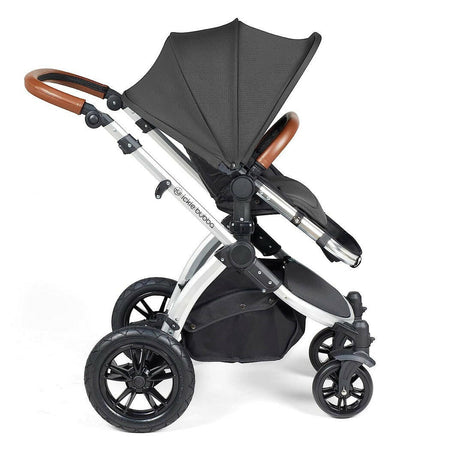 Ickle Bubba Stomp LUXE Travel System with Cirrus Car Seat & ISOFIX Base - Silver/Charcoal/Tan - side view, showing the forward-facing pushchair