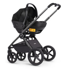 Venicci Upline Travel System 3-in-1 (Misty Rose) - showing the Engo i-Size Car Seat attached to the pushchair chassis using the included car seat adaptors