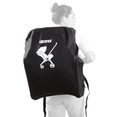 Doona Lightweight Travel Bag Black - being carried on back