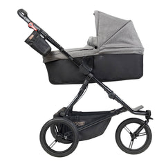 Mountain Buggy Carrycot Plus for URBAN JUNGLE / TERRAIN - Herringbone - shown as pram with carrycot on incline for baby with reflux