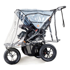 Out n About Nipper DOUBLE v5 Newborn & Toddler Starter Bundle (Rocksalt Grey) - showing the v5 double pushchair wearing the included raincover
