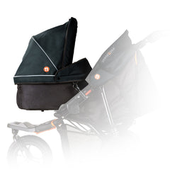 Out n About Nipper Single v5 Carrycot (Forest Black) - side view, showing the carrycot attached to a v5 Nipper single pushchair (pushchair not included, available separately)