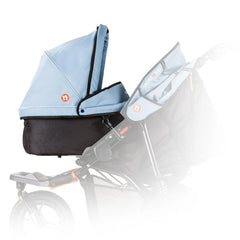 Out n About Nipper Single v5 Carrycot (Rocksalt Grey) - side view, showing the carrycot attached to a v5 Nipper single pushchair (pushchair not included, available separately)