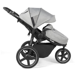Ickle Bubba Venus Max Jogger Stroller (Space Grey/Black) - showing a side view of the stroller with the included footmuff
