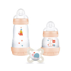 MAM Welcome to the World Set (Peach) - showing the different sized bottles and the included soother (character designs may vary)