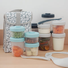 BEABA Baby Food Storage Starter Pack - 12 Clip Containers + 2 Spoons (Storm) - lifestyle image (bag and bib not included)