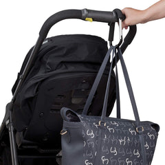 ClevaMama ClevaHooks - Pack of 2 (Extra Large & Regular) - showing the extra large hook attached to a stroller and carrying a bag