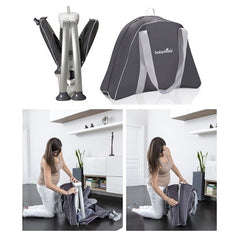Babymoov Swoon Up Carry Bag (Grey) - lifestyle image, showing the bouncer being packed away