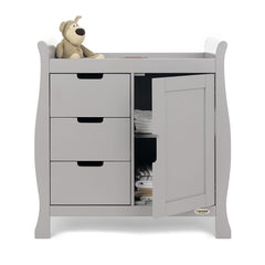 Obaby Stamford Sleigh Changing Unit (Warm Grey) - front view, shown with door open to reveal internal shelves