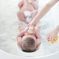 Cheeky Rascals Baby Bath Support (White Grey) - lifestyle image, showing two bath supports with twins