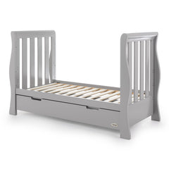 Obaby Stamford Luxe Sleigh Cot Bed with Drawer (Warm Grey) - quarter view, shown here as the junior bed