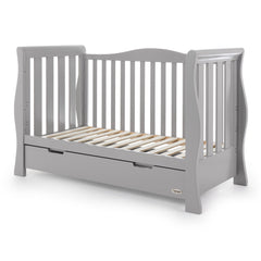 Obaby Stamford Luxe Sleigh Cot Bed with Drawer (Warm Grey) - quarter view, shown here as the sofa/day bed