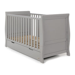 Obaby Stamford Sleigh Cot Bed with Drawer (Warm Grey) - quarter view, shown here as the cot