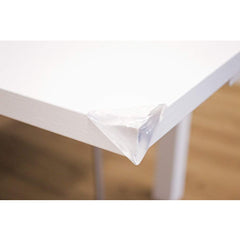 Safety 1st Soft Corner Guards - Pack of 4 (Clear) - lifestyle image, shown fitted to a table`s corner