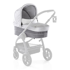 Hauck Saturn Carrycot (Lunar/Stone) - quarter view, showing the carrycot fixed onto the Saturn R`s chassis (stroller not included, available separately)