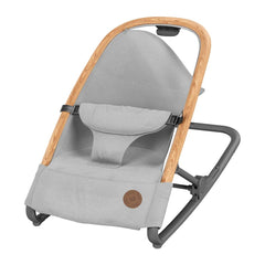 Maxi-Cosi Kori Rocker (Essential Grey) - quarter view, showing the fabric being removed