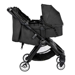Baby Jogger City Tour 2 Carrycot - Double (Pitch Black) - side view, showing the double stroller with two carrycots attached (stroller not included, available separately)
