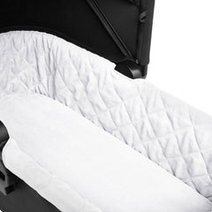 Baby Jogger City Mini 2 Carrycot (Jet) - close view, showing the carrycot`s quilted interior and mattress