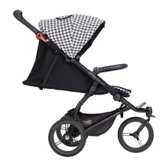 Mountain Buggy Swift - Luxury Collection (Pepita) - side view, shown here with seat in lie-back position for newborns