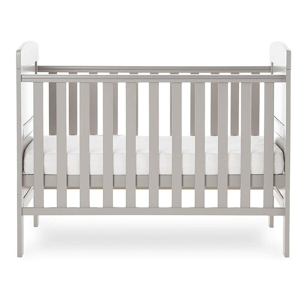 Obaby Grace Mini Cot Bed (Warm Grey) - side view, shown with the mattress base at its middle level (mattress not included, available separately)