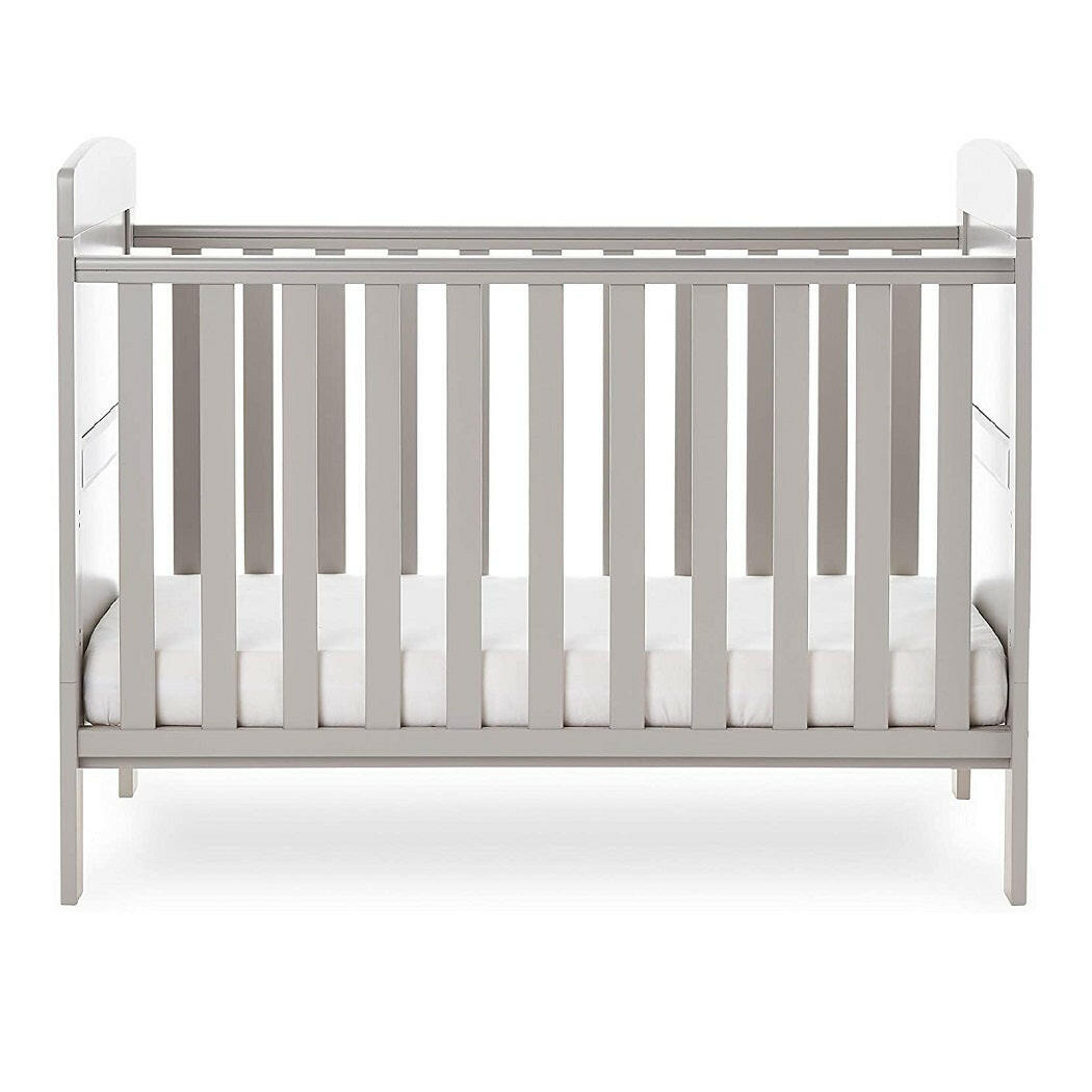 Obaby Grace Mini Cot Bed (Warm Grey) - side view, shown with the mattress base at its lowest level (mattress not included, available separately)