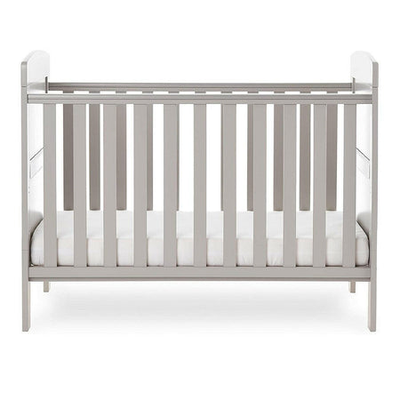 Obaby Grace Mini Cot Bed (Warm Grey) - side view, shown with the mattress base at its lowest level (mattress not included, available separately)
