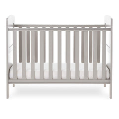 Obaby Grace Mini Cot Bed (Warm Grey) - side view, shown with the mattress base at its lowest level (mattress not included, available separately)