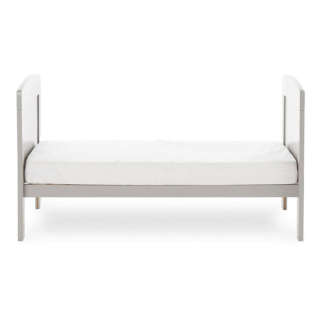 Obaby Grace Mini Cot Bed (Warm Grey) - side view, shown here as the junior bed (mattress not included, available separately)