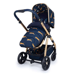 Cosatto Wow Pram & Accessories Bundle - Paloma Faith (On The Prowl) - quarter view, showing the pushchair in parent-facing mode with the footmuff