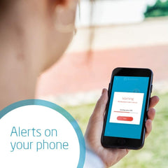 Maxi-Cosi e-Safety Cushion (Black) - showing the SMS warning alarm on a smartphone