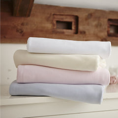 Clair De Lune Fitted Sheets for Pram/Crib Sheets - Pack of 2 (White) - lifestyle image, showing the four colour options