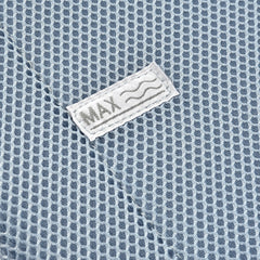 BEABA Transatdo First Stage Baby Bath Support (Blue/Grey) - close view, showing the textured fabric