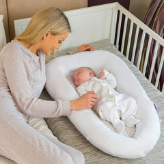 Clevamama ClevaSleep POD (White & Grey Chevron) - lifestyle image, showing the pod being used inside a cot
