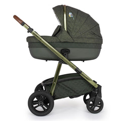 Cosatto Wow Continental Carrycot (Bureau) - side view, showing the carrycot fitted onto the pushchair`s chassis (pushchair not included, available separately)