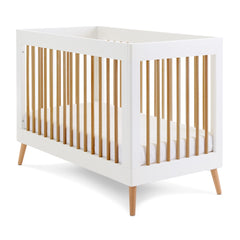 Obaby Maya Mini Cot Bed (White with Natural) - shown here as the cot bed with the mattress base at its lowest level (mattress not included, available separately)