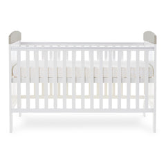 Obaby Grace Inspire Cot Bed (Hello World Koala) - side view, showing the mattress base at its highest level (mattress not included, available separately)