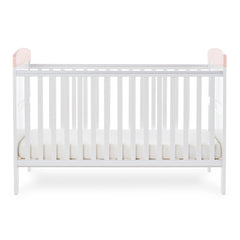 Obaby Grace Inspire Cot Bed (Watercolour Rabbit) - side view, showing the mattress base at its lowest level (mattress not included, available separately)