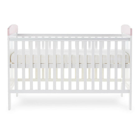 Obaby Grace Inspire Cot Bed (Me & Mini Me Elephants - Pink) - side view, showing the mattress base at its highest level (mattress not included, available separately)