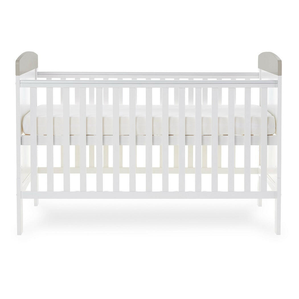 Obaby Grace Inspire Cot Bed (Me & Mini Me Elephants - Grey) - side view, showing the mattress base at its highest level (mattress not included, available separately)
