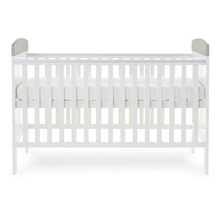 Obaby Grace Inspire Cot Bed (Me & Mini Me Elephants - Grey) - side view, showing the mattress base at its highest level (mattress not included, available separately)