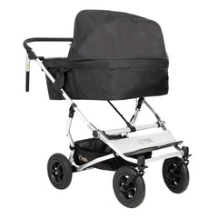 Mountain Buggy Duet v3.2 Carrycot Plus for Twins (Black) - rear view, showing the carrycot fixed onto a chassis (buggy not included, available separately)