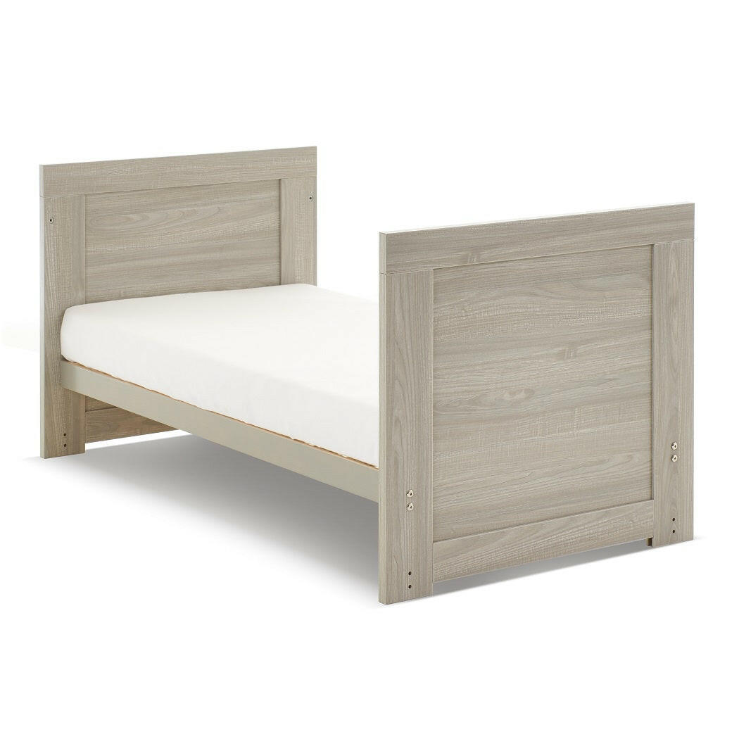 Obaby Nika Mini Cot Bed (Grey Wash) - quarter view, shown here as the junior bed (mattress not included, available separately)