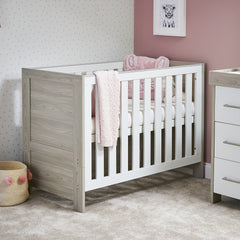 Obaby Nika Mini Cot Bed (Grey Wash & White) - lifestyle image, shown here with the cot bed (matching changing unit not included, available separately)