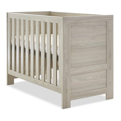 Obaby Nika Mini 2 Piece Room Set (Grey Wash) - quarter view, showing the cot with its mattress base at the highest level (mattress not included, available separately)