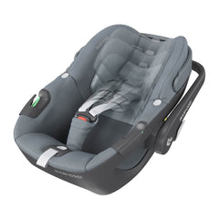 Maxi-Cosi Pebble 360 (Essential Grey) - quarter view, showing the seat`s adjustable headrest and harness