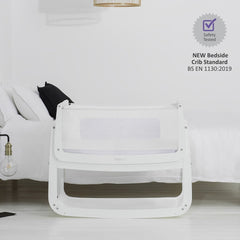 SnuzPod⁴ Bedside Crib 3-in-1 (White) - showing the crib`s safety testing compliance