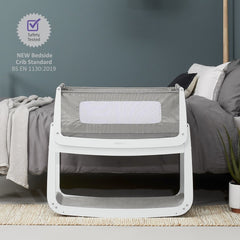 SnuzPod⁴ Bedside Crib 3-in-1 (Dusk) - showing the crib`s safety testing compliance